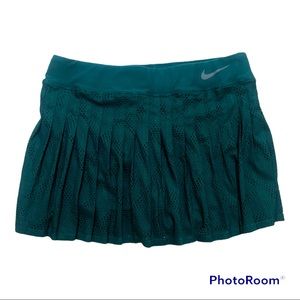 Green Pleated Nike Tennis Skirt Size M. Built in compression shorts.